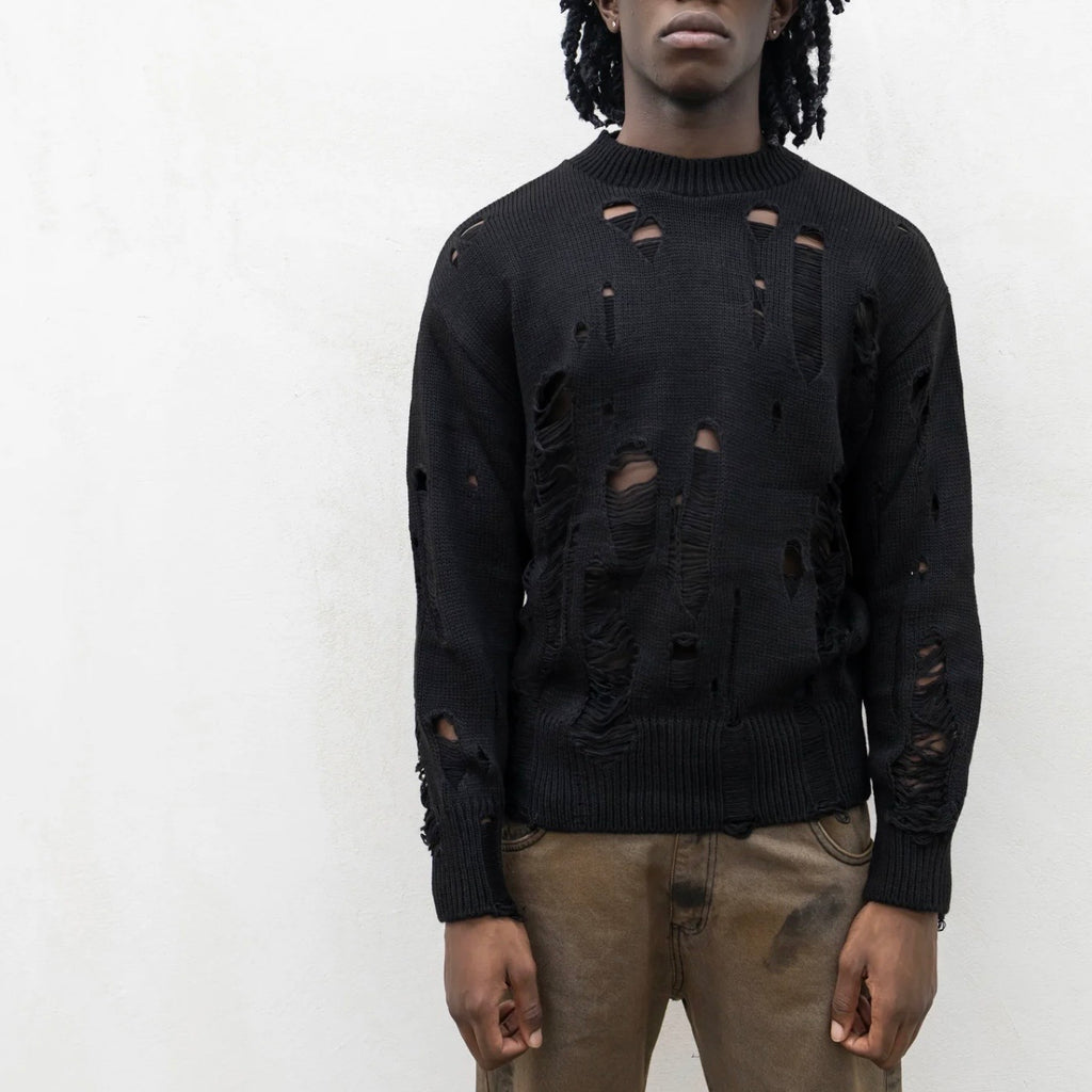 Maglia strappi color nero