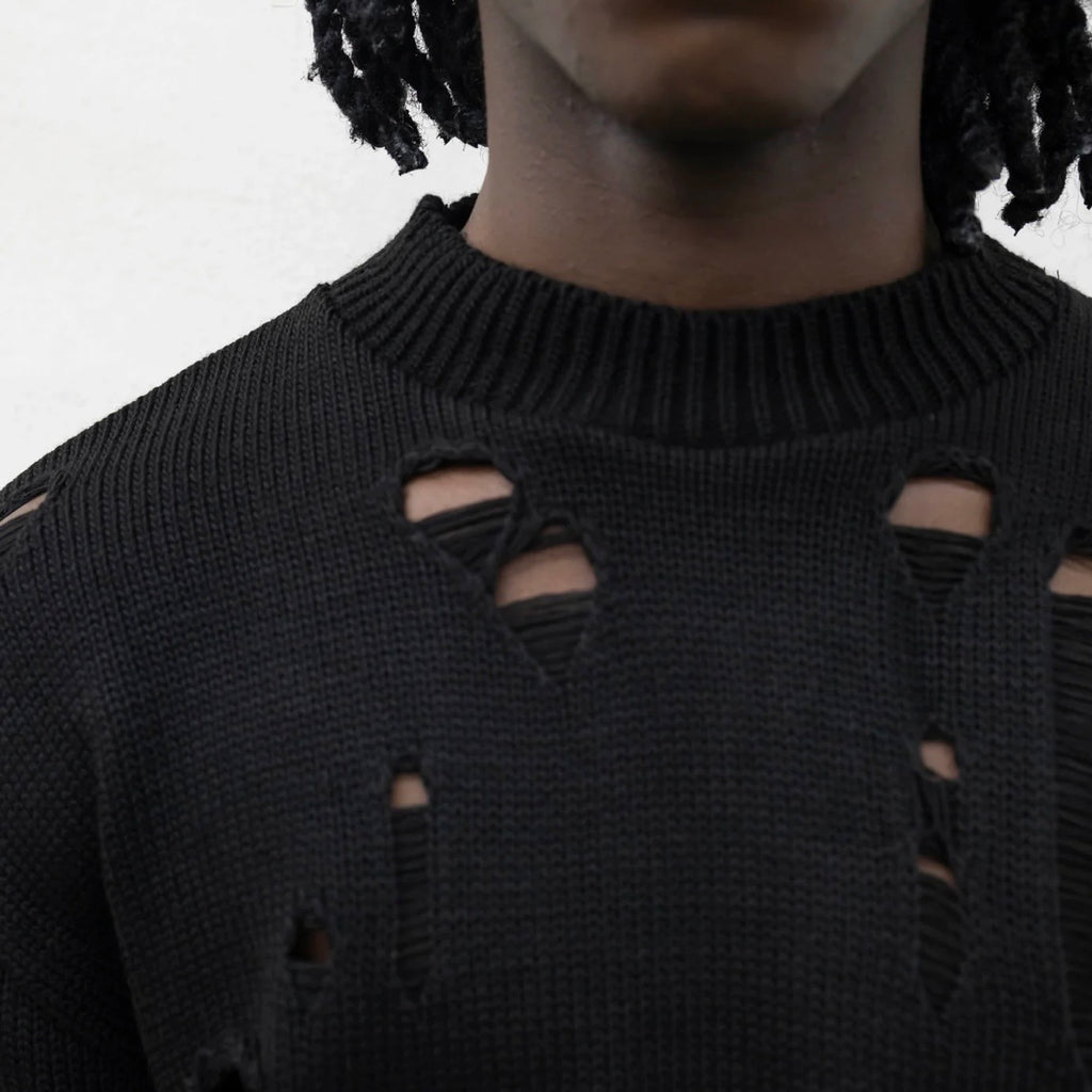 Maglia strappi color nero