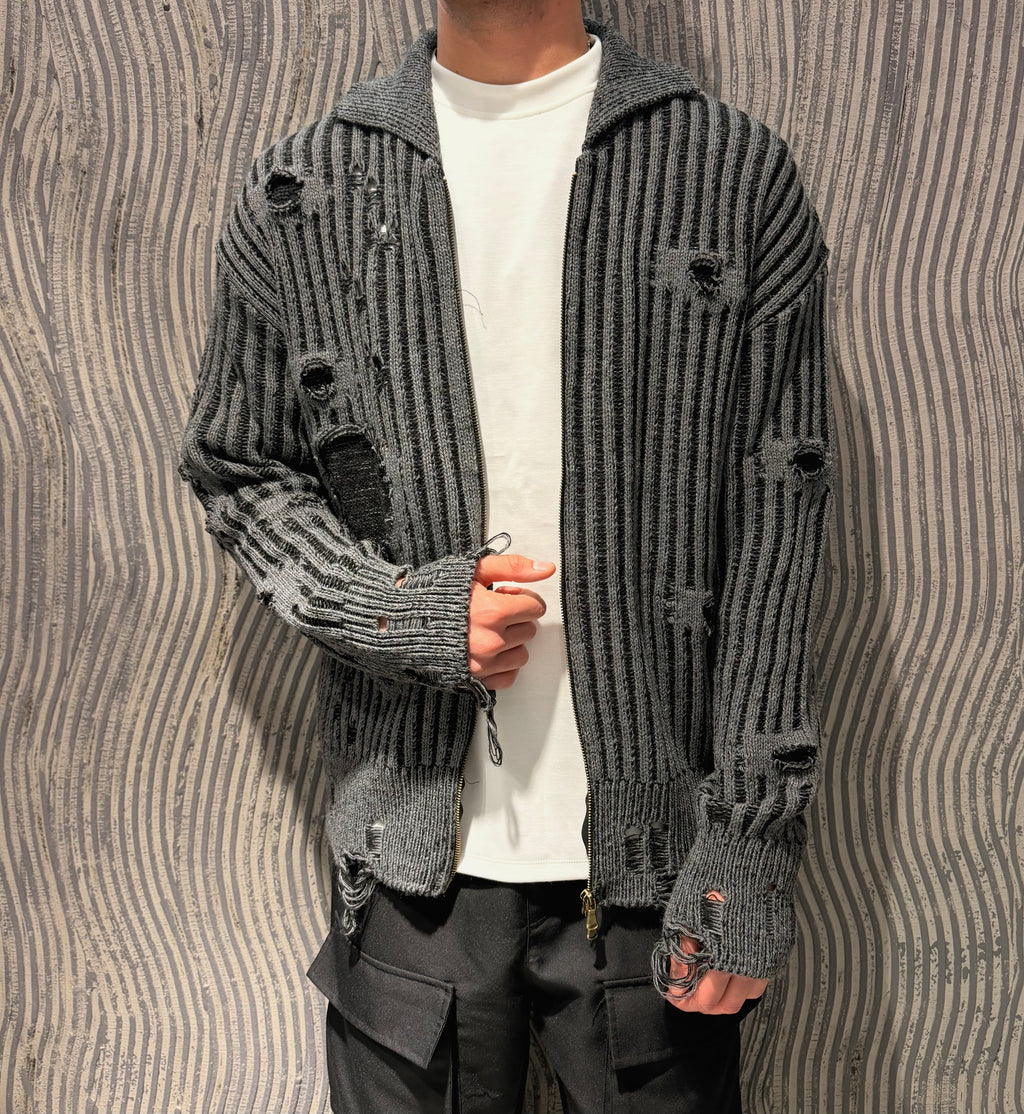 Maglia zip con strappi