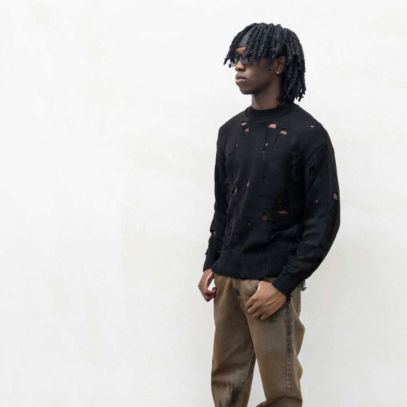 Maglia strappi color nero